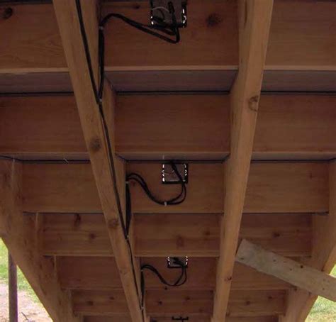 conduit junction box under deck|running electrical cable under deck.